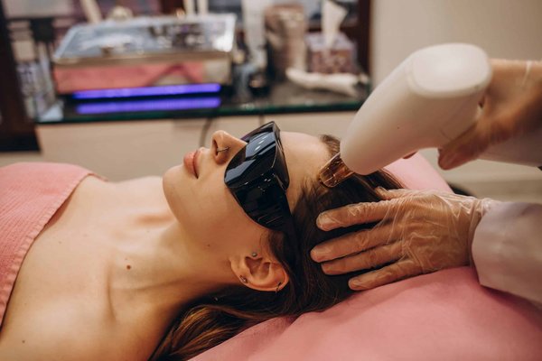 How can you create a stimulating environment for an indoor pet bird?